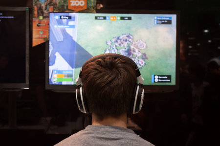 MILAN, ITALY - OCTOBER 26  A boy plays at Games Week 2013, event dedicated to video games and...