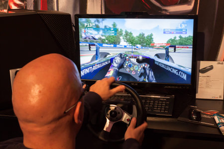 MILAN, ITALY - NOVEMBER 22  Man plays video games at G  come giocare, trade fair dedicated to games,...