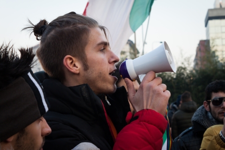 MILAN, ITALY - DECEMBER 10: Demonstrators occupy the city streets blocking the traffic to protest against government and politicians on DECEMBER 10, 2013 in Milan.のeditorial素材
