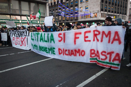 MILAN, ITALY - DECEMBER 13: Demonstrators occupy the city streets blocking the traffic to protest...