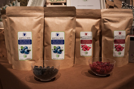 MILAN, ITALY - FEBRUARY 7: Dry blueberries and cranberries for infusion on sale at Olis Festival, event dedicated to holistic disciplines, alternative medicine and natural food on FEBRUARY 7, 2014 in Milan.のeditorial素材