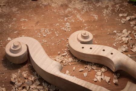 MILAN, ITALY - FEBRUARY 13  Violins under construction at Bit, international tourism exchange reference point for the travel industry on FEBRUARY 13, 2014 in Milan のeditorial素材