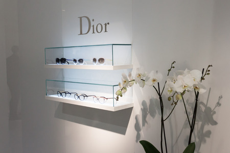 MILAN, ITALY - MARCH 1: Dior glasses on display at Mido, international exhibition for optics, optometry and ophtalmology on MARCH 1, 2014 in Milan.のeditorial素材
