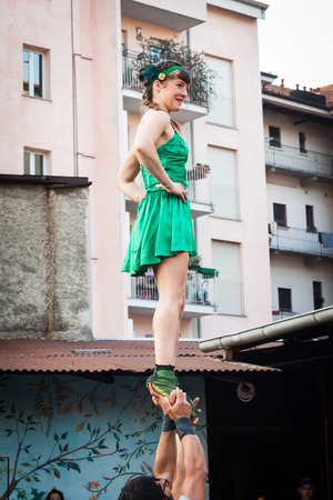 MILAN, ITALY - MARCH 7: Artists perform in their acrobatic show at Milan Clown Festival, international event dedicated to clowns and street theatre on MARCH 7, 2014 in Milan.のeditorial素材
