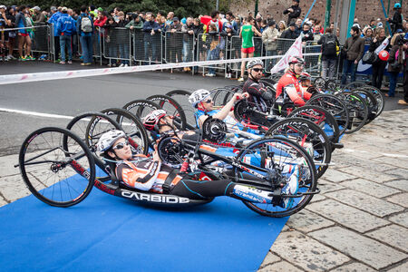 MILAN, ITALY - MARCH 23: Disabled athletes take part in Stramilano, traditional half marathon through the city streets on MARCH 23, 2014 in Milan.のeditorial素材