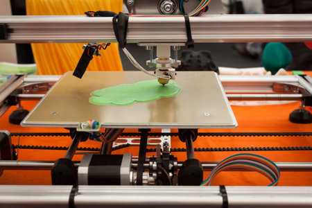 MILAN, ITALY - MARCH 30: Detail of 3d printer at Robot and Makers Milano Show, event dedicated to...