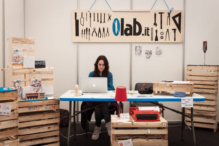 MILAN, ITALY - MARCH 30: Exhibitor in her stand at Robot and Makers Milano Show, event dedicated to...