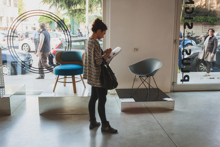 MILAN, ITALY - APRIL 11: People visit Fuorisalone at Ventura Lambrate space, location of important events during Milan Design week on APRIL 11, 2014 in Milanのeditorial素材