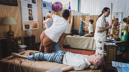 MILAN, ITALY - APRIL 27: Thai massage at Orient Festival, event dedicated to Oriental culture and traditions on APRIL 27, 2014 in Milan.のeditorial素材