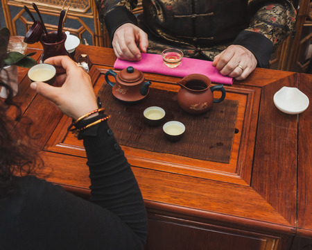 MILAN, ITALY - APRIL 27: Tea ceremony at Orient Festival, event dedicated to Oriental culture and traditions on APRIL 27, 2014 in Milan.のeditorial素材