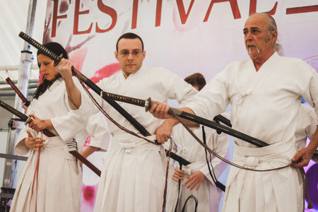 MILAN, ITALY - APRIL 27: Katana sword fighters at Orient Festival, event dedicated to Oriental culture and traditions on APRIL 27, 2014 in Milan.のeditorial素材