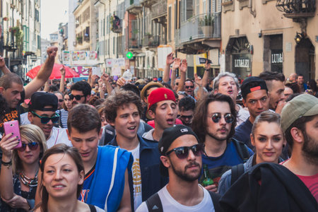 MILAN, ITALY - MAY 1: Thousands of people take part in Mayday parade to celebrate the international...