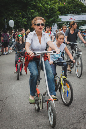 MILAN, ITALY - MAY 11: Thousands of people take part in Cyclopride, event dedicated to bicycles and sustainable mobility on MAY 11, 2014 in Milan.のeditorial素材