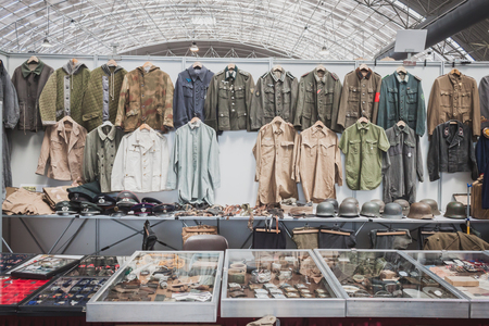 MILAN, ITALY - MAY 18: Stand with uniforms at Militalia, exhibition dedicated to militaria collectors and military associations on MAY 18, 2014 in Milan.のeditorial素材