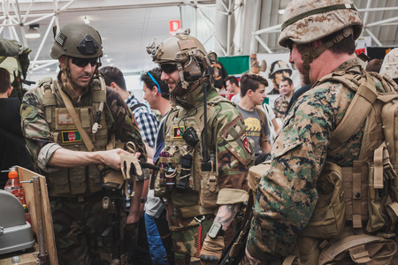 MILAN, ITALY - MAY 18: People in uniform visit Militalia, exhibition dedicated to militaria collectors and military associations on MAY 18, 2014 in Milan.のeditorial素材