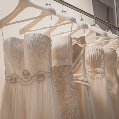 MILAN, ITALY - MAY 23: Elegant ceremony dresses on display at Si' Sposaitalia, ultimate exhibition for bridal and formal wear industry on MAY 23, 2014 in Milan.のeditorial素材