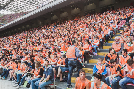 MILAN, ITALY - JUNE 2: 50.000 teenagers take part in a ceremony at San Siro stadium where archbishop Scola meets them before they receive the sacrament of Confirmation on JUNE 2, 2014 in Milan.のeditorial素材