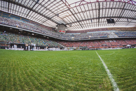 MILAN, ITALY - JUNE 2: 50.000 teenagers take part in a ceremony at San Siro stadium where archbishop Scola meets them before they receive the sacrament of Confirmation on JUNE 2, 2014 in Milan.のeditorial素材