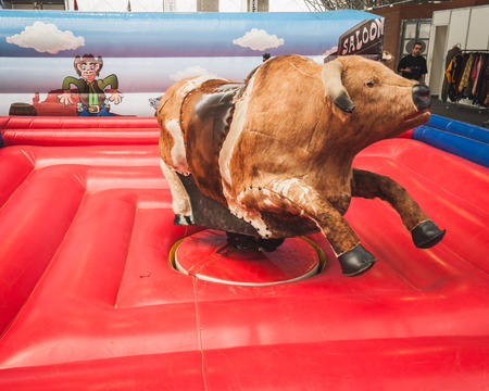 MILAN, ITALY - JUNE 22  Mechanical bull on display at Rocking The Park, event dedicated to American music and lifestyle of the 40s, 50s and 60s on JUNE 22, 2014 in Milan のeditorial素材
