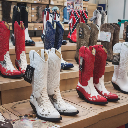 MILAN, ITALY - JUNE 22  Cowboy boots on display at Rocking The Park, event dedicated to American music and lifestyle of the 40s, 50s and 60s on JUNE 22, 2014 in Milan のeditorial素材
