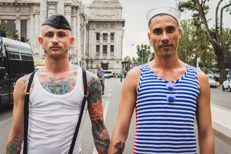 MILAN, ITALY - JUNE 28: People at gay pride parade in Milan JUNE 28, 2014. Thousands of people march in the city streets for the annual gay pride parade, claiming equality and legal rights. のeditorial素材