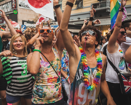 MILAN, ITALY - JUNE 28: People at gay pride parade in Milan JUNE 28, 2014. Thousands of people march in the city streets for the annual gay pride parade, claiming equality and legal rights. のeditorial素材