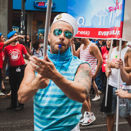 MILAN, ITALY - JUNE 28: People at gay pride parade in Milan JUNE 28, 2014. Thousands of people march in the city streets for the annual gay pride parade, claiming equality and legal rights. のeditorial素材