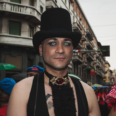 MILAN, ITALY - JUNE 28: People at gay pride parade in Milan JUNE 28, 2014. Thousands of people march in the city streets for the annual gay pride parade, claiming equality and legal rights. のeditorial素材