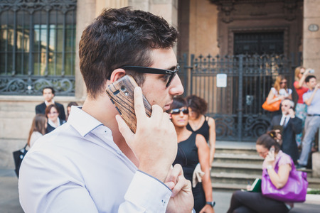 MILAN, ITALY - JULY 16: Business people take part in a flash mob to promote the official launch of The Wolf of Wall Street on DVD and Blue-Ray on July 16, 2014 in Milan.のeditorial素材