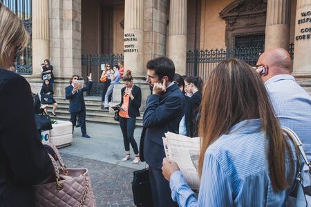 MILAN, ITALY - JULY 16: Business people take part in a flash mob to promote the official launch of The Wolf of Wall Street on DVD and Blue-Ray on July 16, 2014 in Milan.のeditorial素材