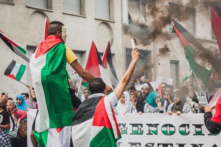 MILAN, ITALY - JULY 26: People march and protest against Gaza strip bombing in solidarity with Palestinians on JULY 26, 2014 in Milan.のeditorial素材