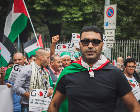 MILAN, ITALY - JULY 26: People march and protest against Gaza strip bombing in solidarity with Palestinians on JULY 26, 2014 in Milan.のeditorial素材