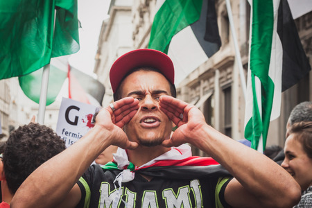 MILAN, ITALY - JULY 26: People march and protest against Gaza strip bombing in solidarity with Palestinians on JULY 26, 2014 in Milan.のeditorial素材