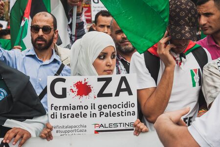 MILAN, ITALY - JULY 26: People march and protest against Gaza strip bombing in solidarity with Palestinians on JULY 26, 2014 in Milan.のeditorial素材