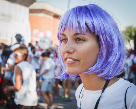 MILAN, ITALY - SEPTEMBER 6: Thousands of people take part in the Color Run event, the funniest and most colorful urban running ever on SEPTEMBER 6, 2014 in Milan.のeditorial素材