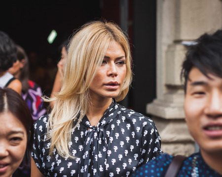 MILAN, ITALY - SEPTEMBER 17: Woman outside Gucci fashion shows building for Milan Women's Fashion Week on SEPTEMBER 17, 2014 in Milan.のeditorial素材