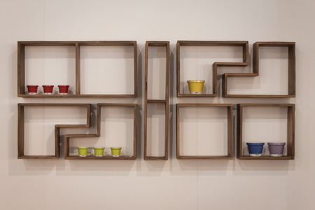 MILAN, ITALY - SEPTEMBER 13: Wooden shelf on dislay at HOMI, home international show and point of reference for all those in the sector of interior design on SEPTEMBER 13, 2014 in Milan.のeditorial素材