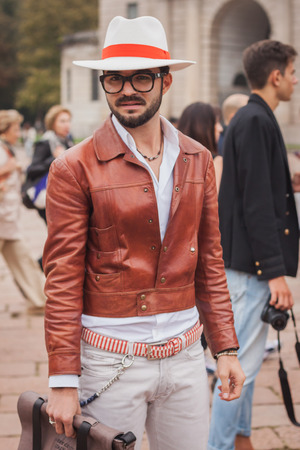 MILAN, ITALY - SEPTEMBER 20: Man poses outside Cavalli fashion shows building for Milan Women's Fashion Week on SEPTEMBER 20, 2014 in Milan.のeditorial素材
