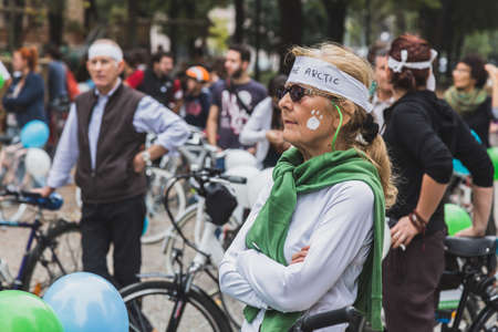MILAN, ITALY - OCTOBER 4: People take part in the Ice Ride, global bike event organized by Greenpeace to demand protection for the Arctic on OCTOBER 4, 2014 in Milan.のeditorial素材