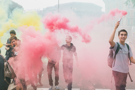 MILAN, ITALY - OCTOBER 10: Thousands of students march in the city streets to protest agaist the money cuts in the public school on OCTOBER 10, 2014 in Milan.のeditorial素材