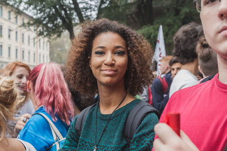 MILAN, ITALY - OCTOBER 10: Thousands of students march in the city streets to protest agaist the money cuts in the public school on OCTOBER 10, 2014 in Milan.のeditorial素材