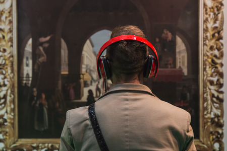 MILAN, ITALY - OCTOBER 22: Man with headphones visiting Smau, international exhibition of information communications technology on OCTOBER 22, 2014 in Milan.のeditorial素材