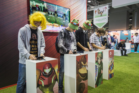 MILAN, ITALY - OCTOBER 24: People play at Games Week 2014, event dedicated to video games and...