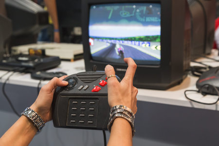 MILAN, ITALY - OCTOBER 24: People play at Games Week 2014, event dedicated to video games and...