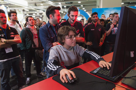 MILAN, ITALY - OCTOBER 24: Young boy plays at Games Week 2014, event dedicated to video games and...
