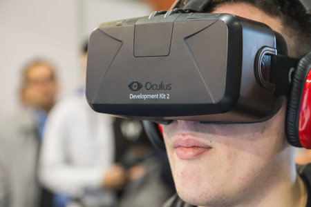MILAN, ITALY - OCTOBER 24: Guy tries Oculus headset at Games Week 2014, event dedicated to video...