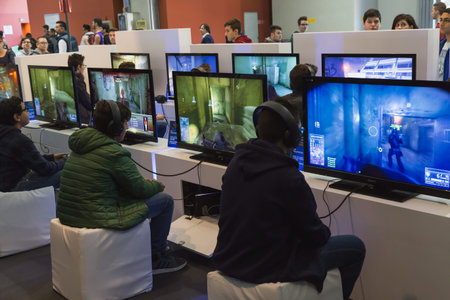 MILAN, ITALY - OCTOBER 24: People play at Games Week 2014, event dedicated to video games and...