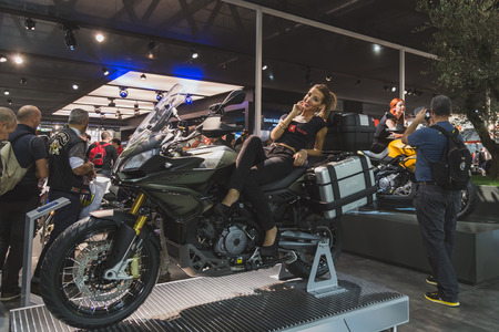 MILAN, ITALY - NOVEMBER 5: People visit EICMA, international motorcycle exhibition on NOVEMBER 5, 2014 in Milan.のeditorial素材