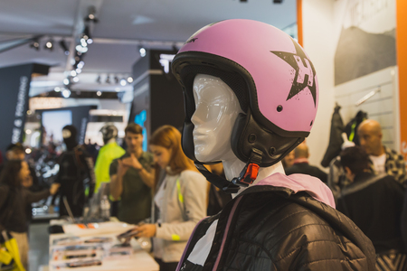 MILAN, ITALY - NOVEMBER 5: Pink helmet on display at EICMA, international motorcycle exhibition on NOVEMBER 5, 2014 in Milan.のeditorial素材