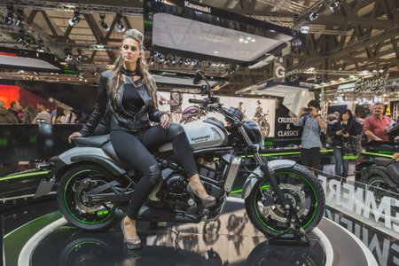 MILAN, ITALY - NOVEMBER 5: Beautiful model poses at EICMA, international motorcycle exhibition on...